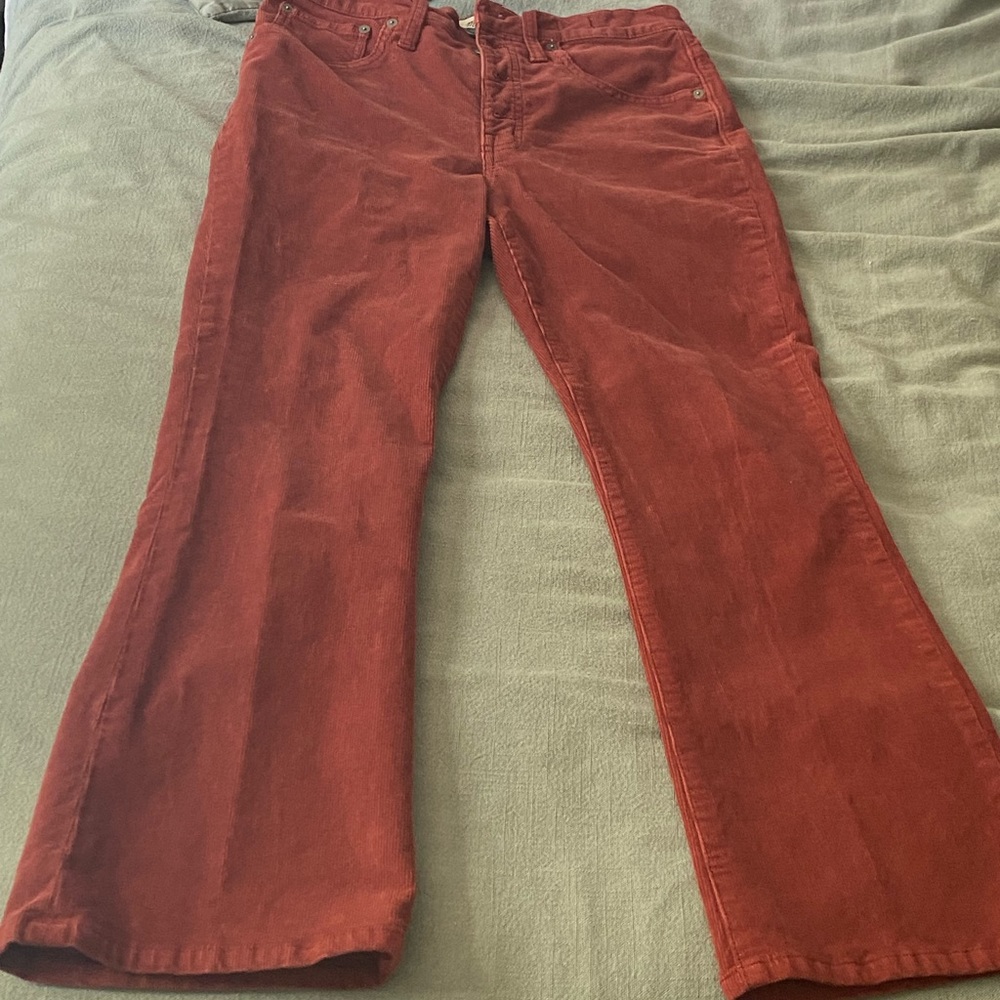 Rust color Madewell Cali demo boot button jeans
